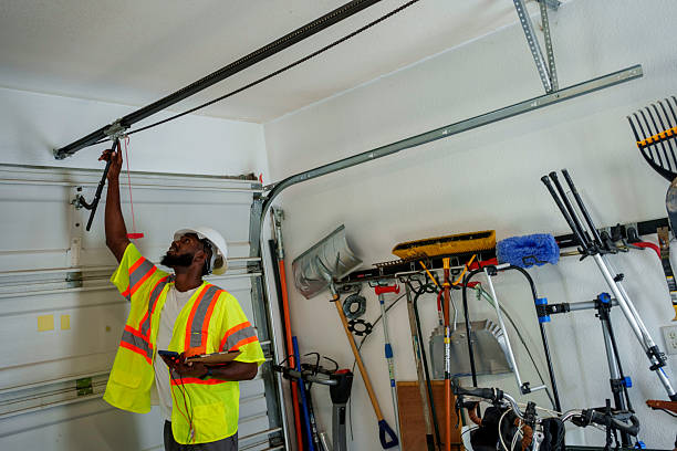 Professional Garage Door Panel Replacement technician working in Round Lake Beach, IL